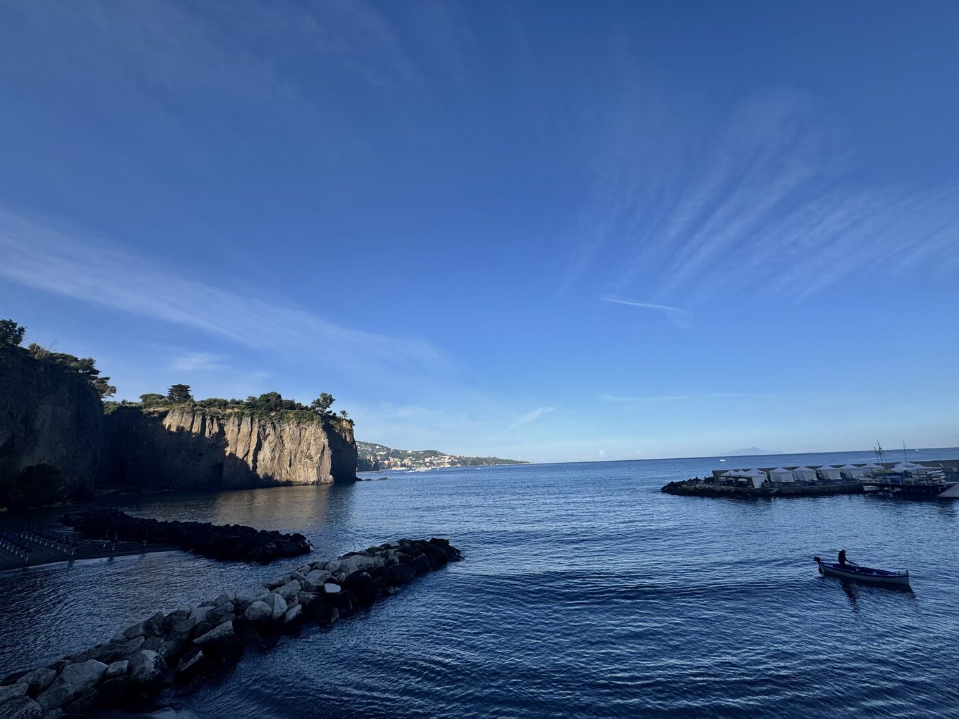Brilliant blue water and open sky along the Italian coast